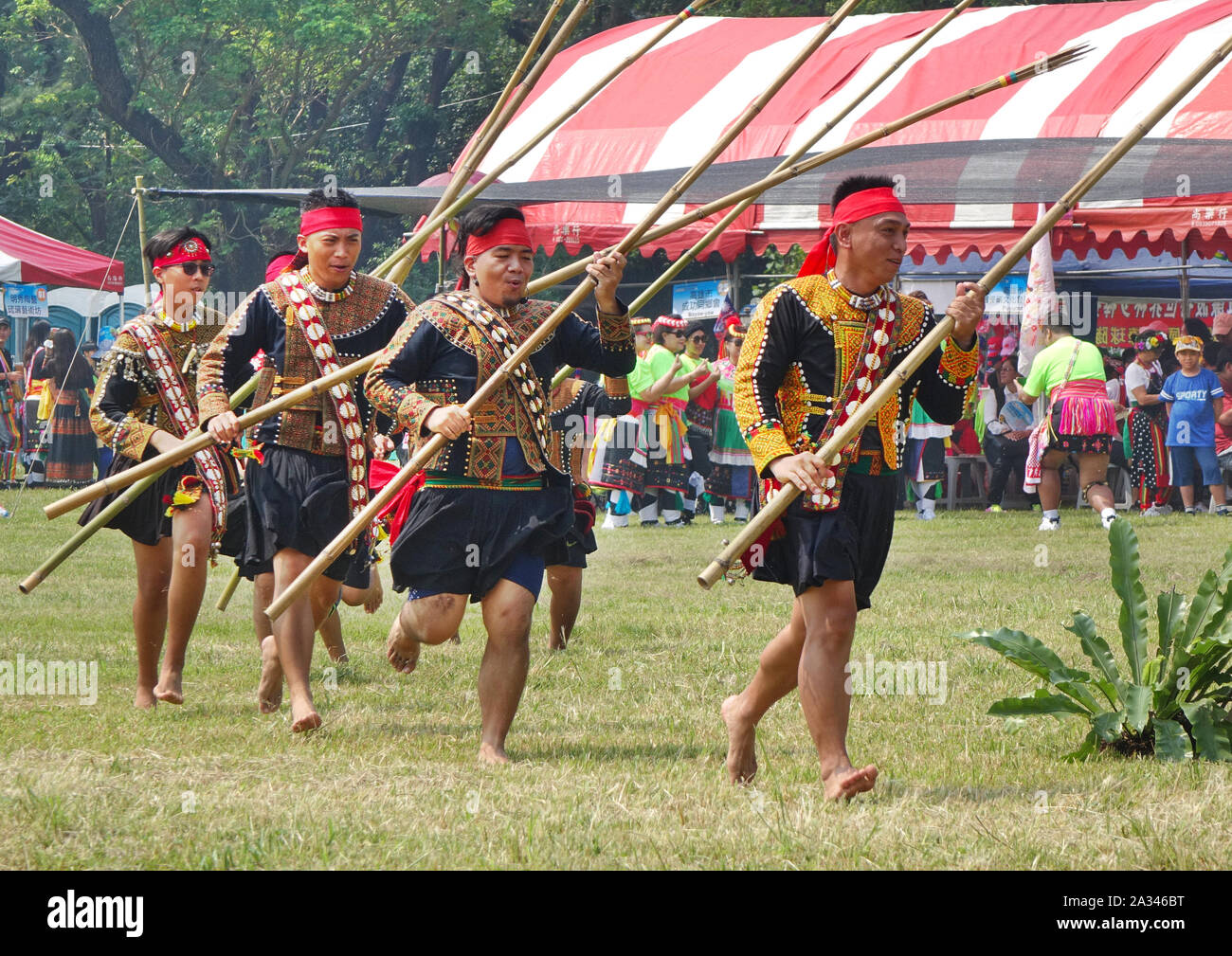 KAOHSIUNG, TAIWAN -- SEPTEMBER 28, 2019: Men with bamboo spears of the