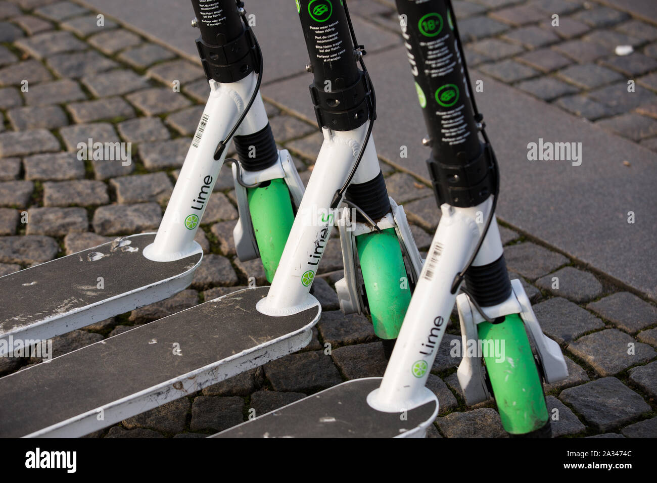 Lime electric scooters seen on a sidewalk in Gothenburg Stock Photo Alamy