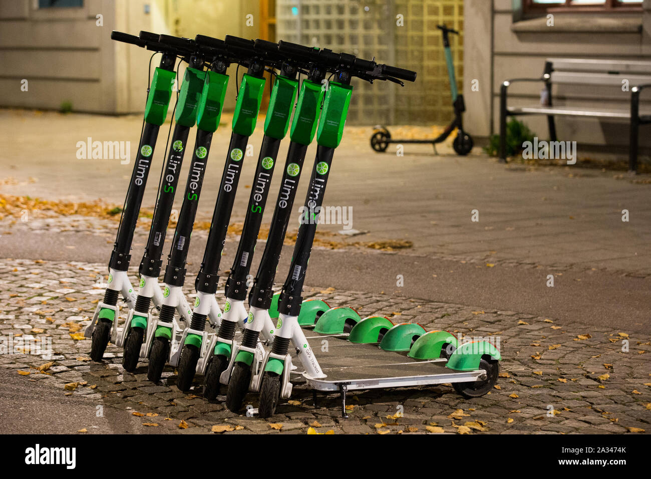 Lime electric scooters seen on a sidewalk in Gothenburg Stock Photo Alamy