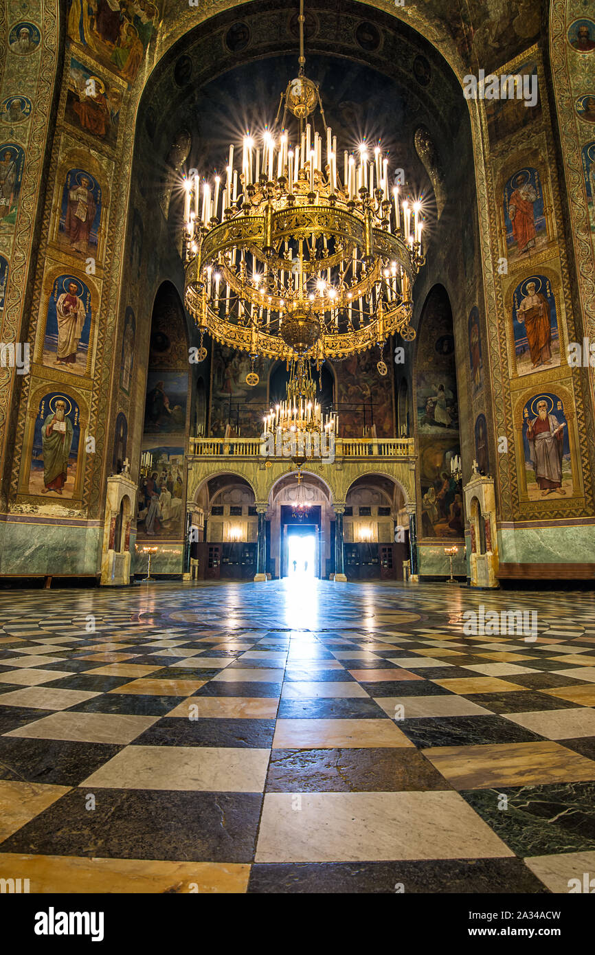 Entrance and interior of the Cathedral of St. Alexander Nevsky completely frescoed by icons of Orthodox saints in Sofia, Bulgaria Stock Photo