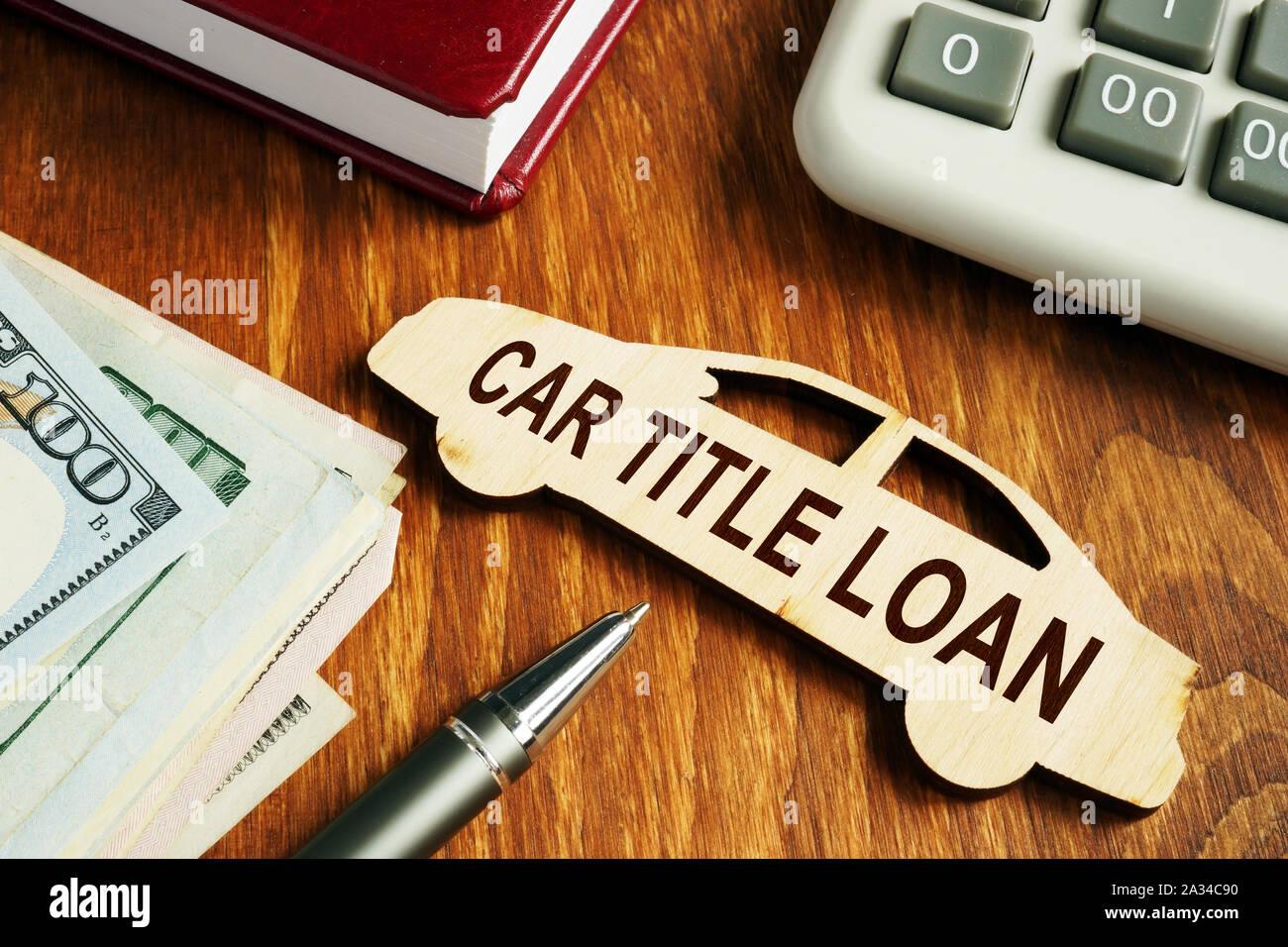 Car title loan concept. Wooden model of vehicle and money Stock Photo Alamy