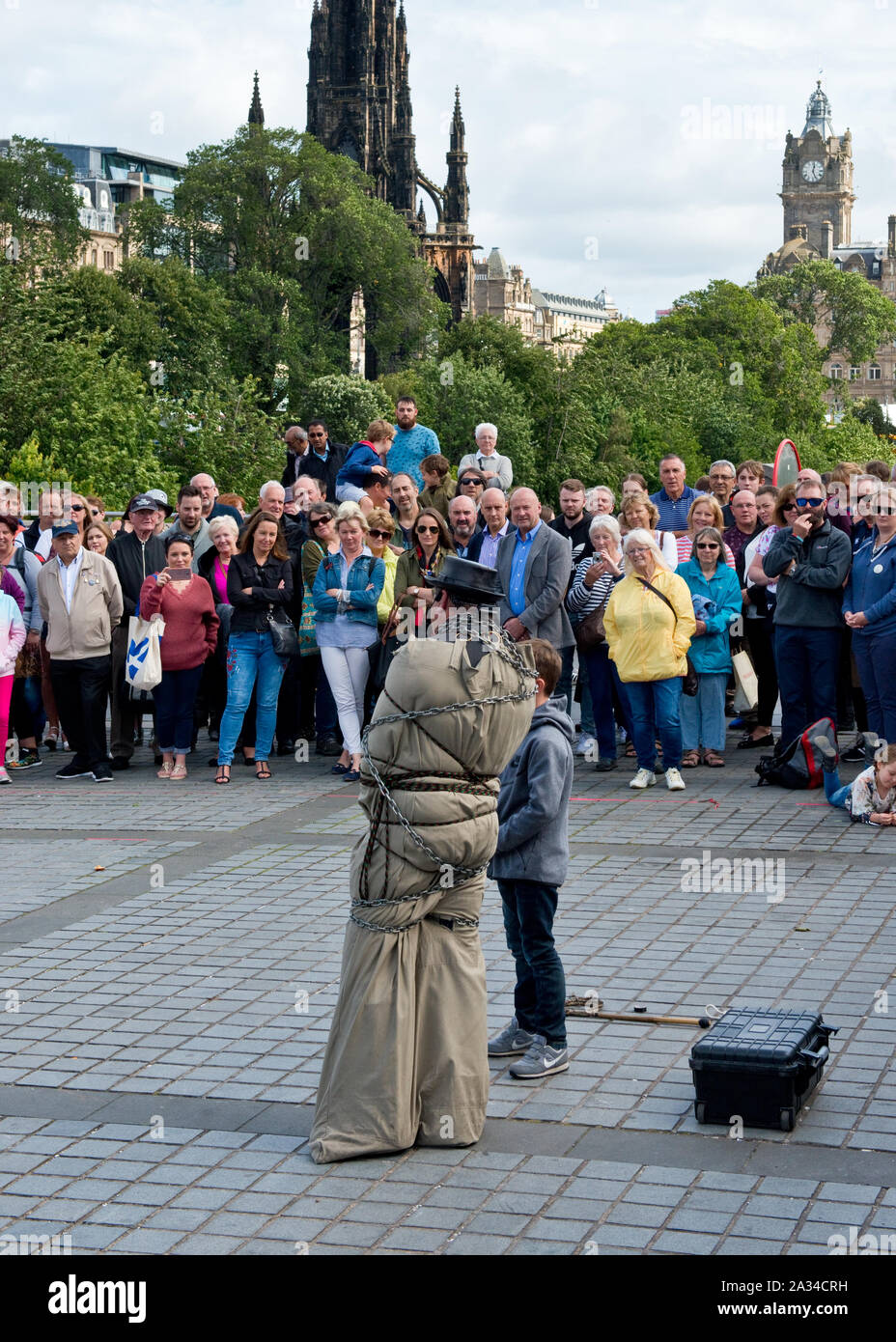 Escapology street act during the Edinburgh Fringe Festival. Stock Photo