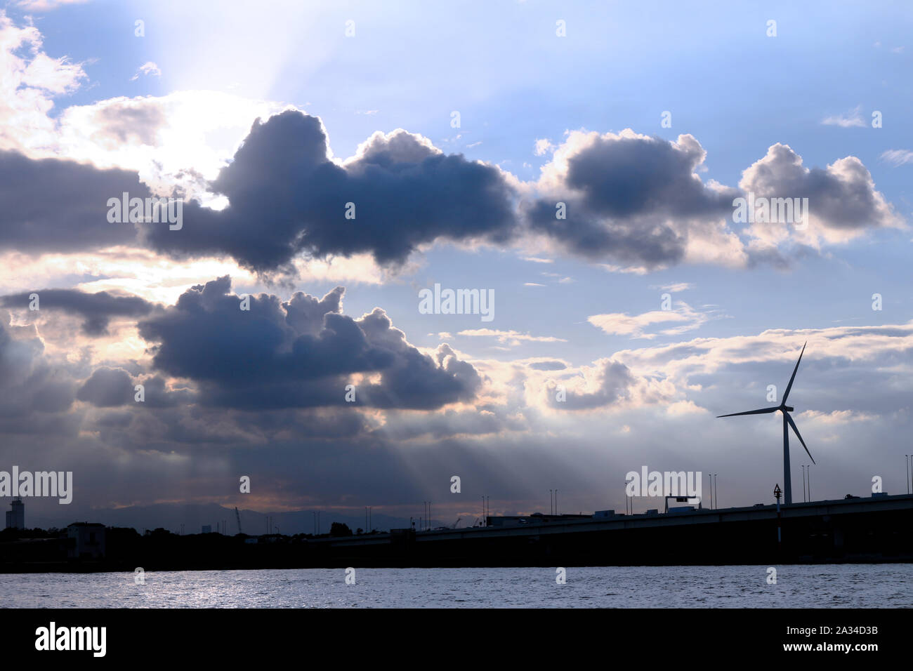 A wind power generator built in a dramatic sky Stock Photo