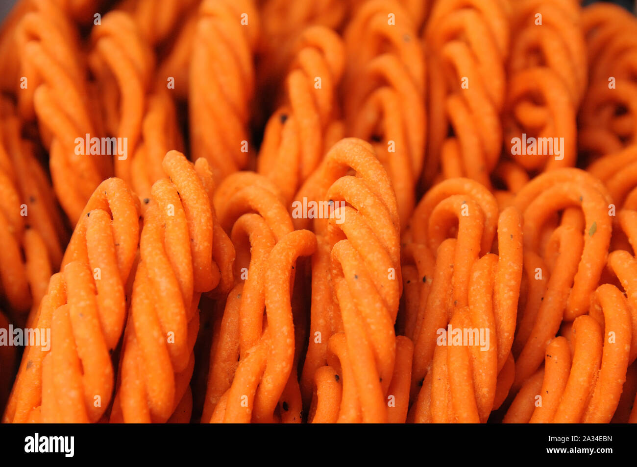 Jalebi made with chickpea flour and soaked in a saffron syrup South