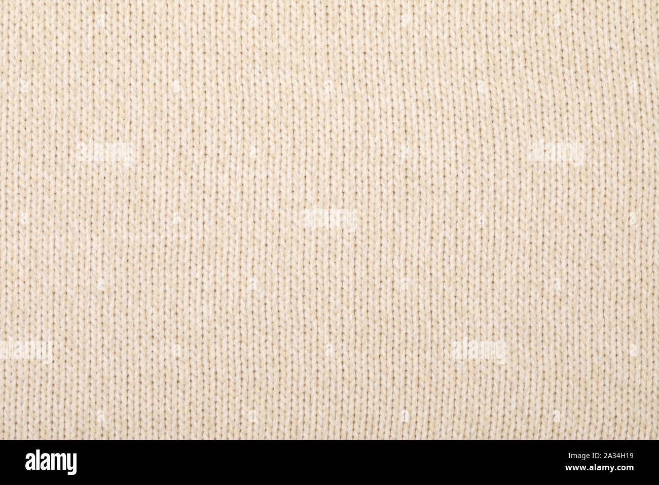 Real beige melange or ombre knitted fabric with ornamental pattern