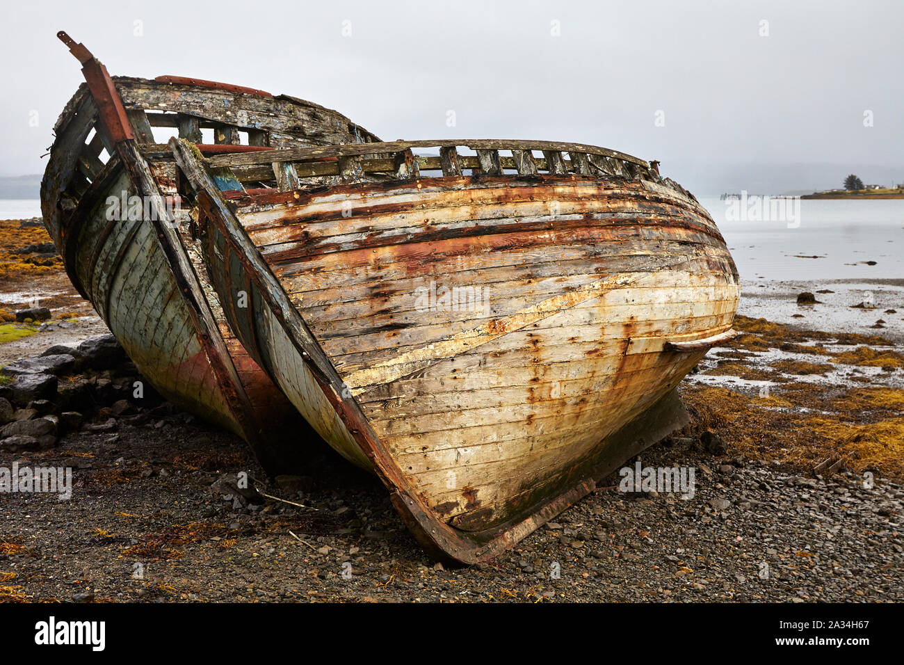 Abandoned boats on a beach near Salen on the Isle of Mull in Scotland, UK Stock Photo