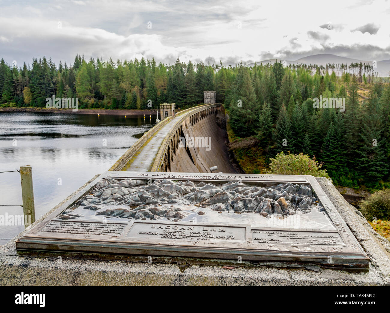 An information tile and Laggan Dam structure at Loch Laggan and River Spean in Scotland Stock Photo