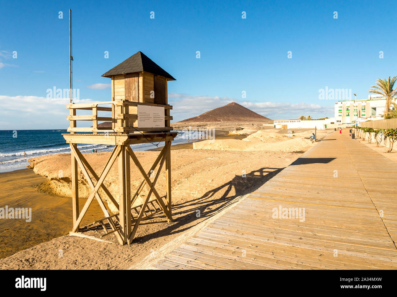 A wooden boardwalk along the beach at El Medano town in Tenerife, Canary Islands, Spain Stock Photo