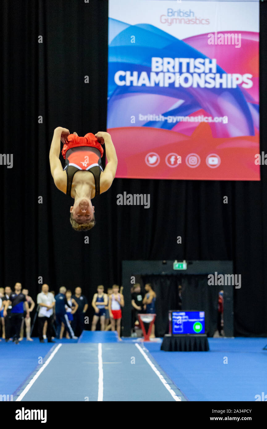 Birmingham, England, UK. 28 September 2019. Jamie Kris Harcourt (Bromley Valley Gymnastics Centre) in action during the Trampoline, Tumbling and DMT British Championship Qualifiers at the Arena Birmingham, Birmingham, UK. Stock Photo