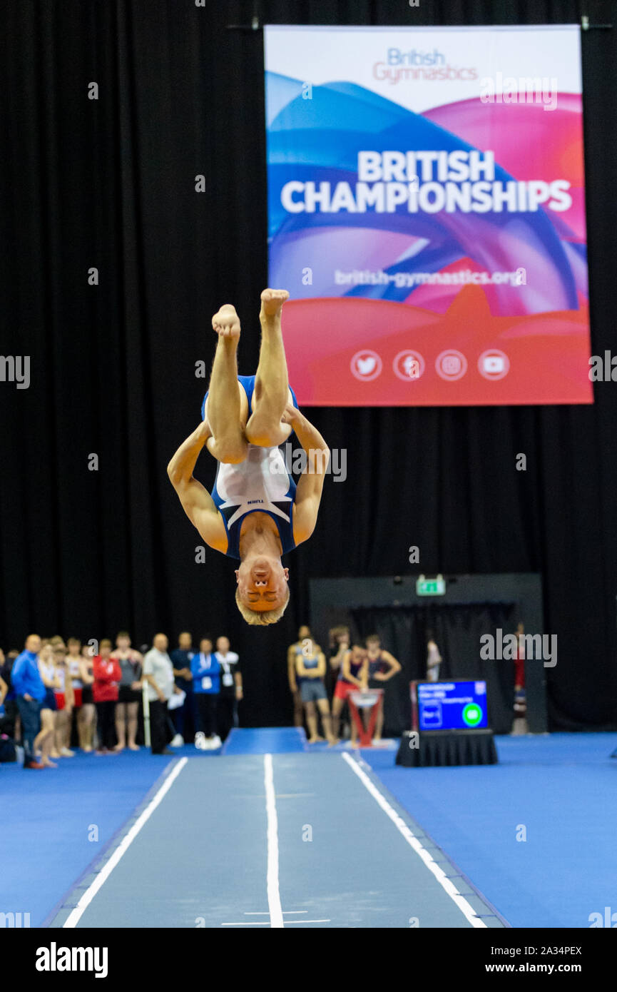 Birmingham, England, UK. 28 September 2019. William Cowen (Pinewood Gymnastics Club) in action during the Trampoline, Tumbling and DMT British Championship Qualifiers at the Arena Birmingham, Birmingham, UK. Stock Photo