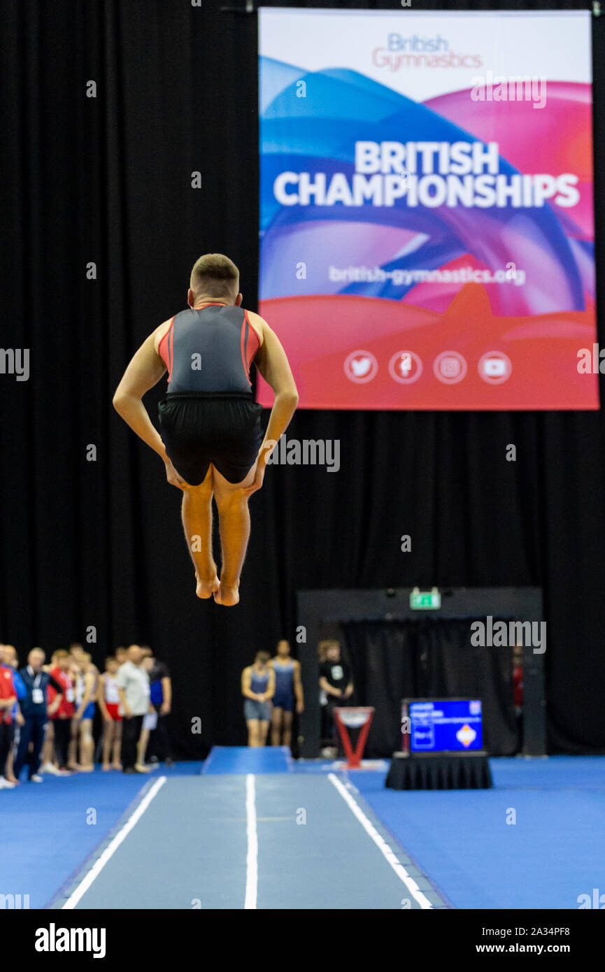 Birmingham, England, UK. 28 September 2019. Jay Fennell (Basingstoke Gymnastics Club) in action during the Trampoline, Tumbling and DMT British Championship Qualifiers at the Arena Birmingham, Birmingham, UK. Stock Photo