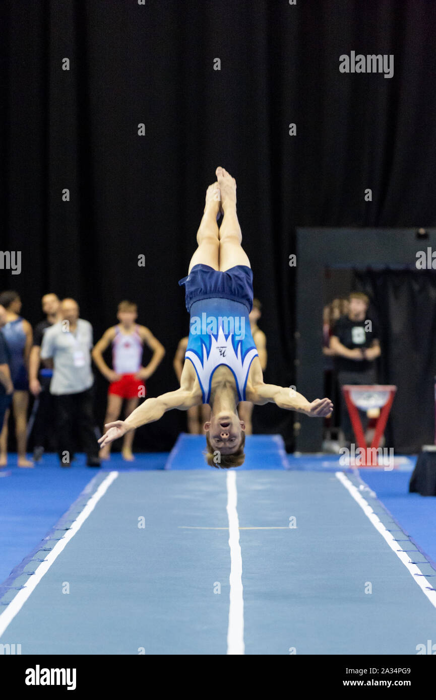 Birmingham, England, UK. 28 September 2019. Issac Bennison (Stainsby School of Gymnastics) in action during the Trampoline, Tumbling and DMT British Championship Qualifiers at the Arena Birmingham, Birmingham, UK. Stock Photo
