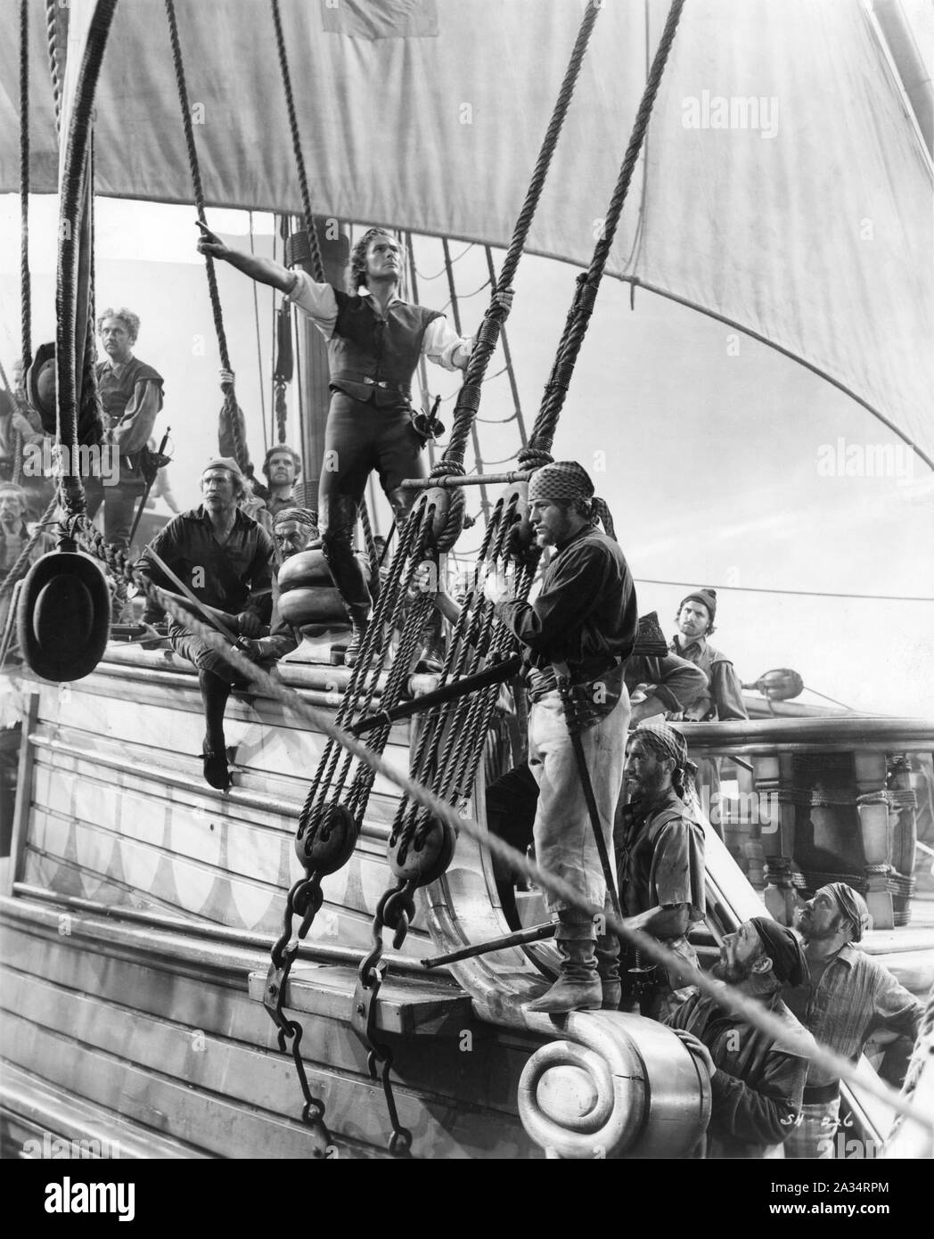 ERROL FLYNN as Captain Geoffrey Thorpe with crew of The Albatross in THE SEA HAWK 1940 director MICHAEL CURTIZ music Erich Wolfgang Korngold Warner Bros. Stock Photo