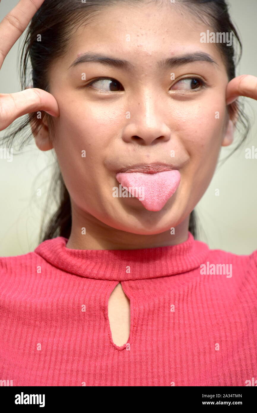 Beautiful Diverse Girl Making Funny Faces Stock Photo - Alamy