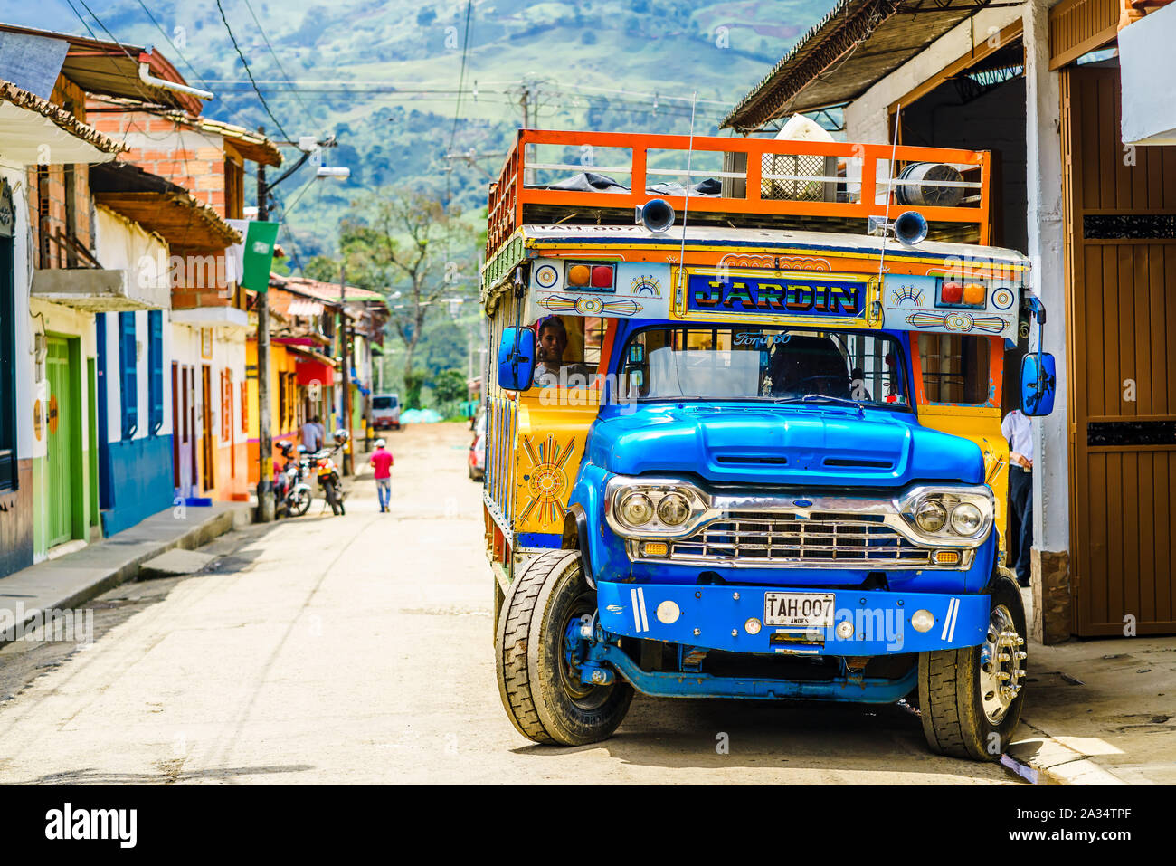 View on typical colorful chicken bus in Jardin, Antioquia, Colombia, South America on 27th March 2019  Stock Photo