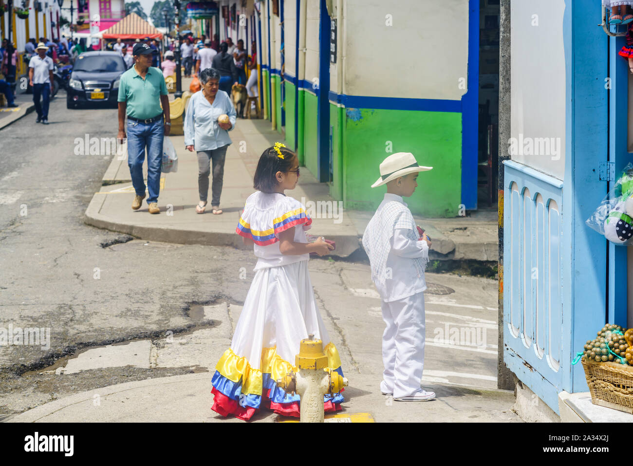 Children dressed with traditional colombian costumes in Salento, Colombia Stock Photo