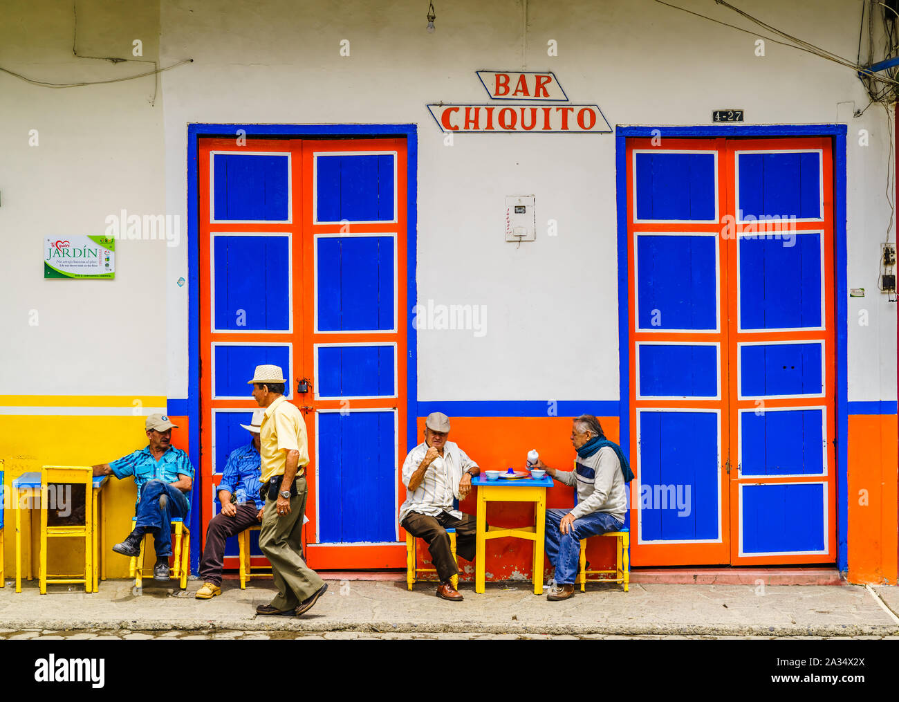 El Jardin, Colombia - March 27, 2019 - View on people sitting in front of a bar in the center of the town Stock Photo
