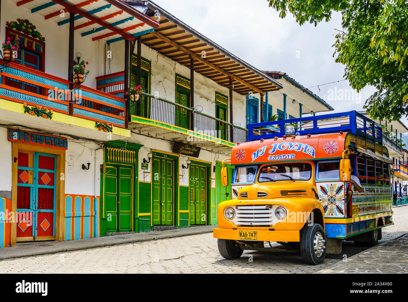View on typical colorful chicken bus in Jardin, Antioquia, Colombia, South America on 27th March 2019  Stock Photo