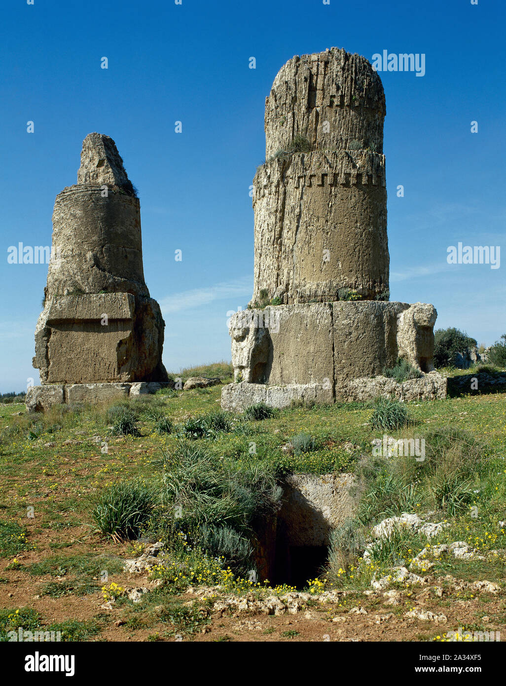 Syria. Amrit or Marathos. Ancient Phoenician city, founded in 3rd millennium BC. Burial towers called 'al Maghazil' or The Spindles. (Photo taken before the Syrian Civil War). Stock Photo