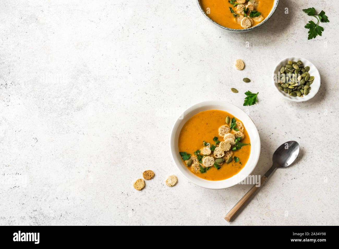 Pumpkin Soup With Croutons And Parsley In Bowls On White Background Top View Copy Space Healthy Seasonal Diet Vegetarian Food Homemade Soup Stock Photo Alamy Pumpkin Soup With Croutons And Parsley In Bowls On White Background Top View Copy Space Healthy Seasonal Diet Vegetarian Food Homemade Soup Stock Photo Alamy