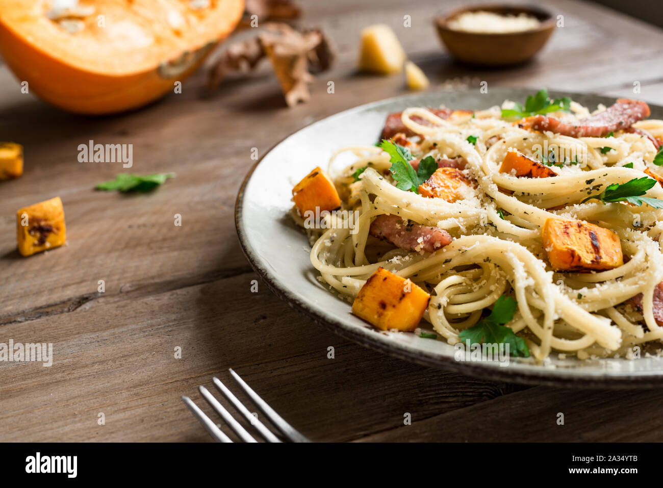 Pumpkin And Bacon Pasta With Grated Parmesan Cheese Homemade Spaghetti Pumpkin Pasta On Wooden Close Up Seasonal Autumn Food Pasta Pumpkin Carbona Stock Photo Alamy