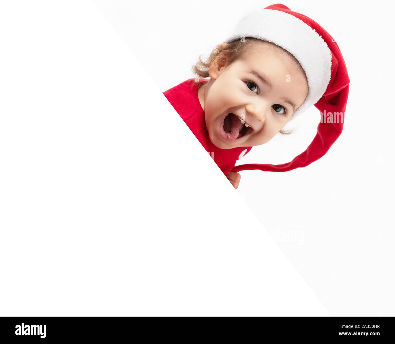 Adorable baby girl is happy smiling for christmas. Stock Photo