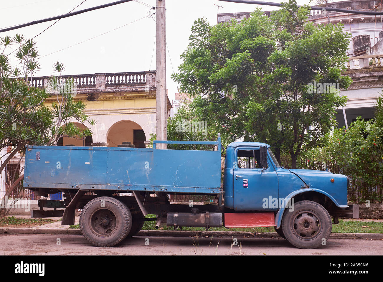 Classic cars, taxis, trucks and motorcycles are abundant on the streets of Trinidad and Havana, Cuba Stock Photo