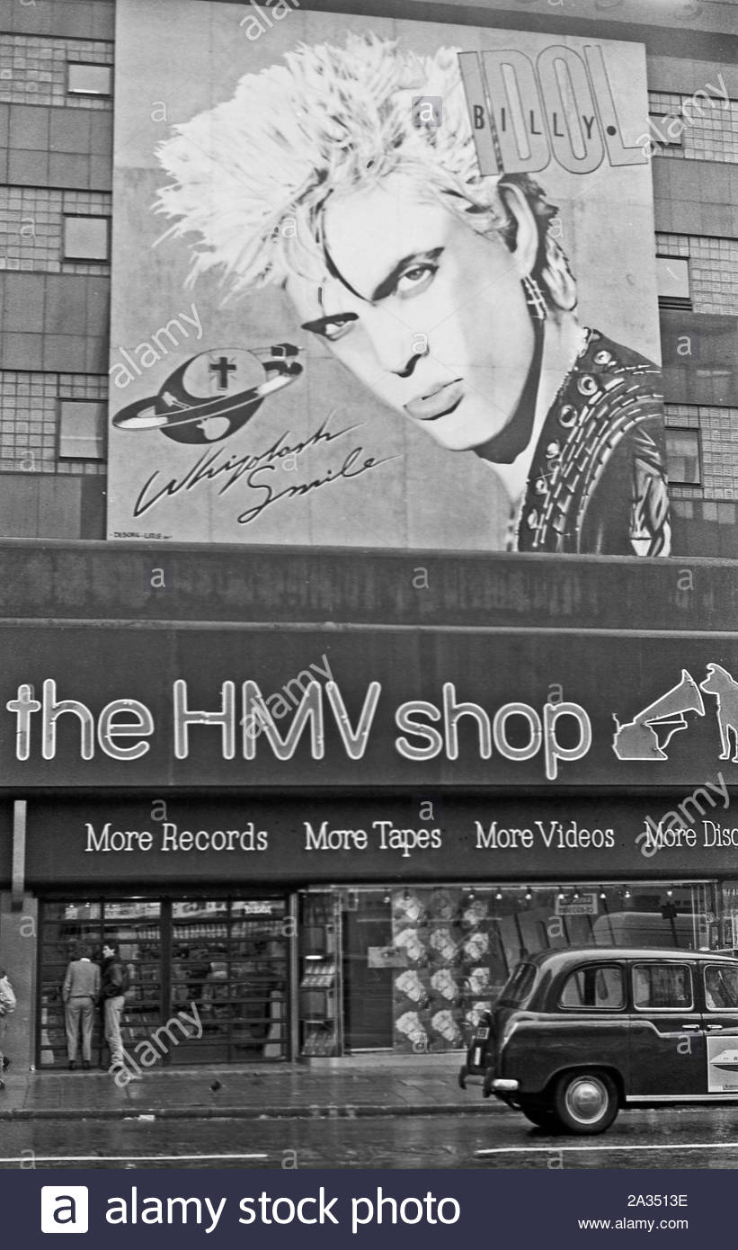 HMV Shop Oxford Street London, with Billy Idol Whiplash Smile album promotional Billboard above the store entrance from 1986 Stock Photo