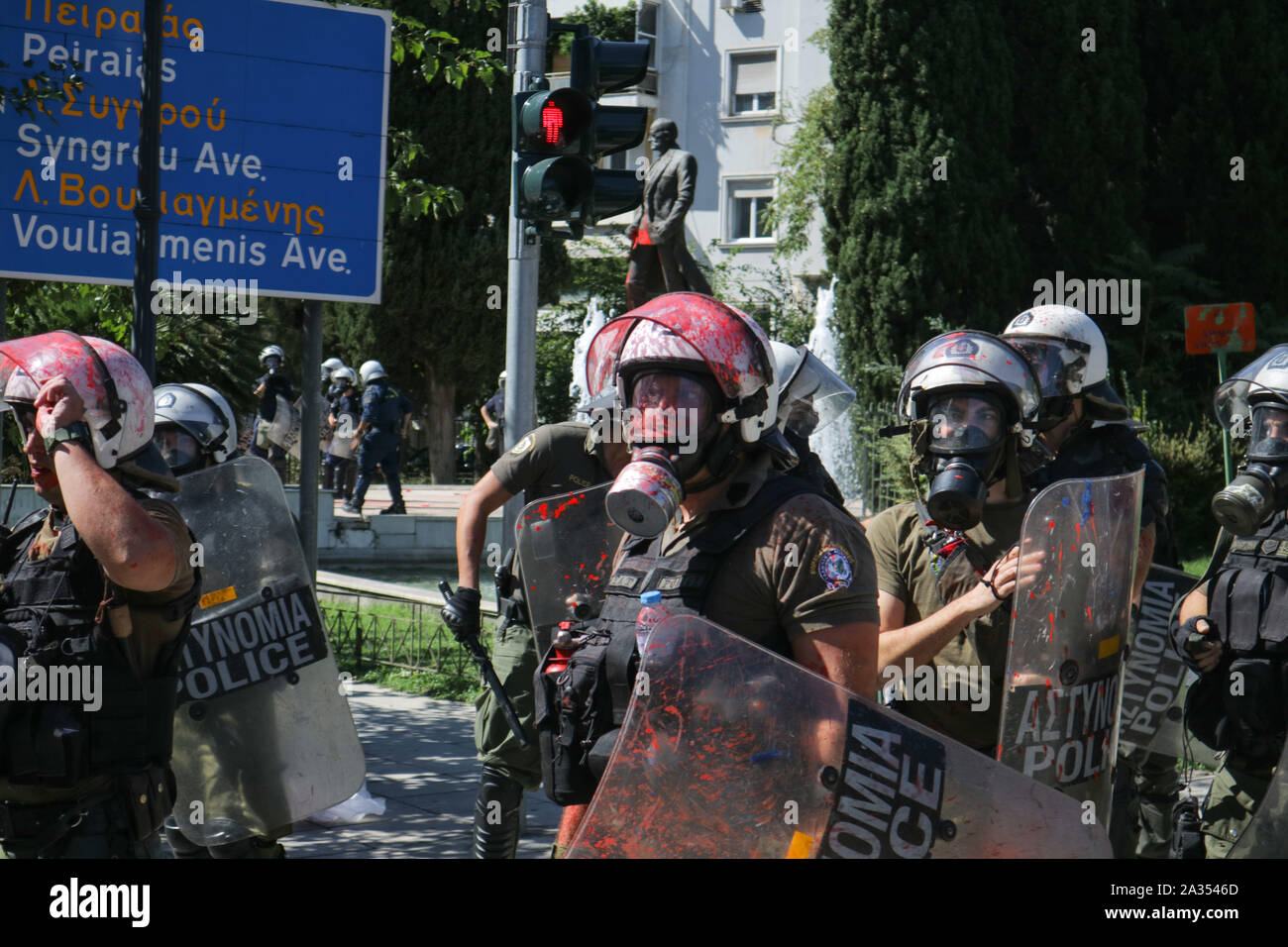 Athens - Greece: Riot police after communist-affiliated protesters ...