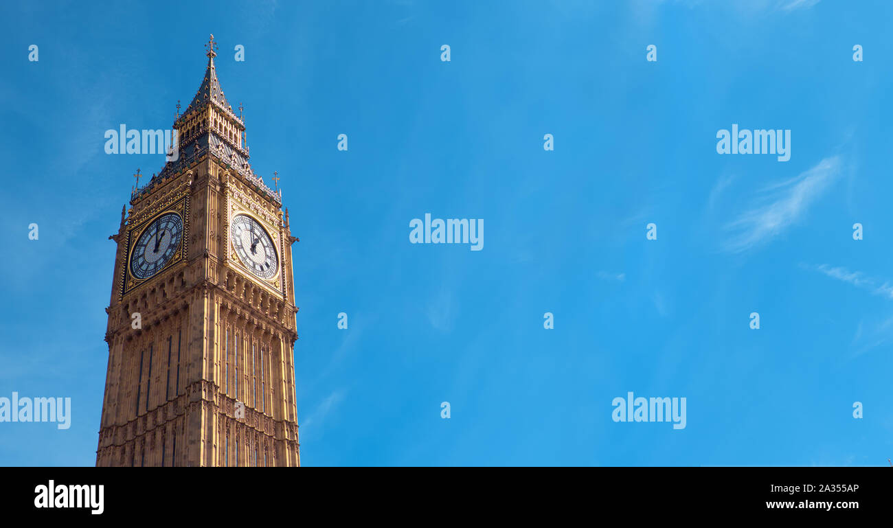 Big Ben Clock Tower in London, UK, on a bright day. Panoramic image