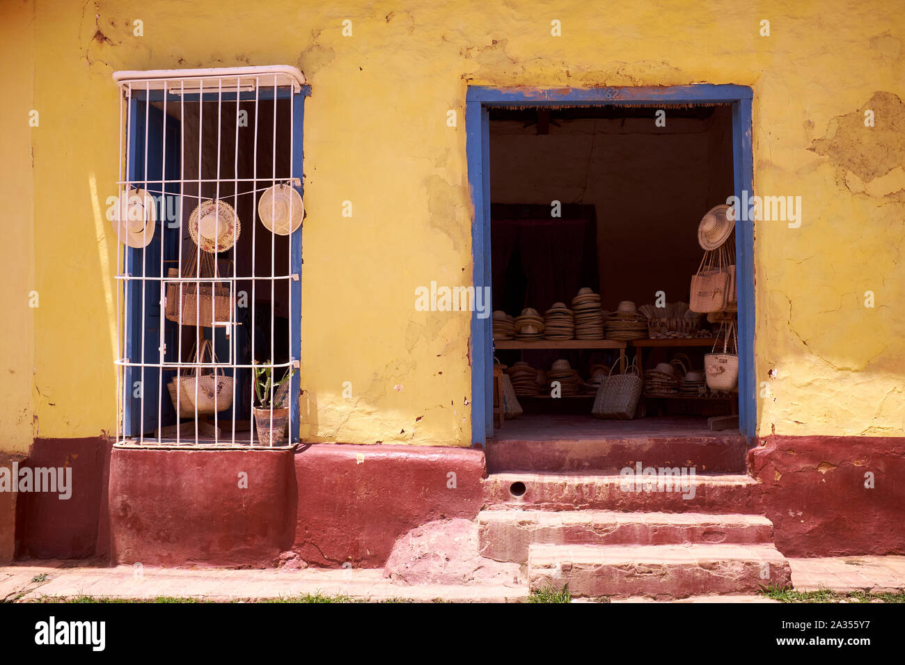 A shop selling straw hats in Trinidad, Cuba Stock Photo