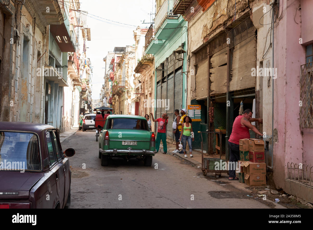 People walk the streets of Havana, Cuba Stock Photo