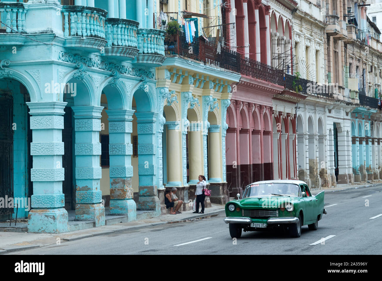 Colourful colonial buildings and classic cars are distinctive characteristics of Havana, Cuba Stock Photo