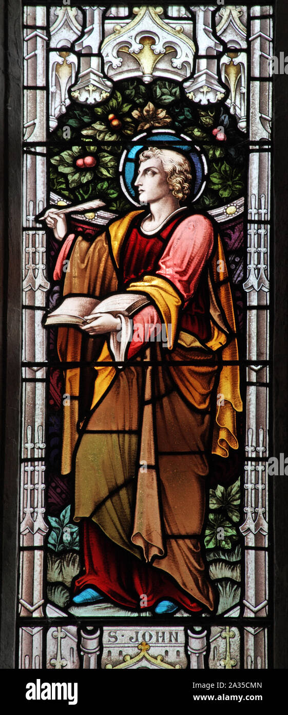 A stained glass window of 1902 by Swaine Bourne & Sons depicting St John the Evangelist, Church of St Lawrence, Barton on the Heath, Warwickshire Stock Photo