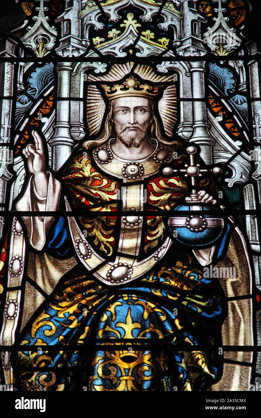 A stained glass window depicting Christ