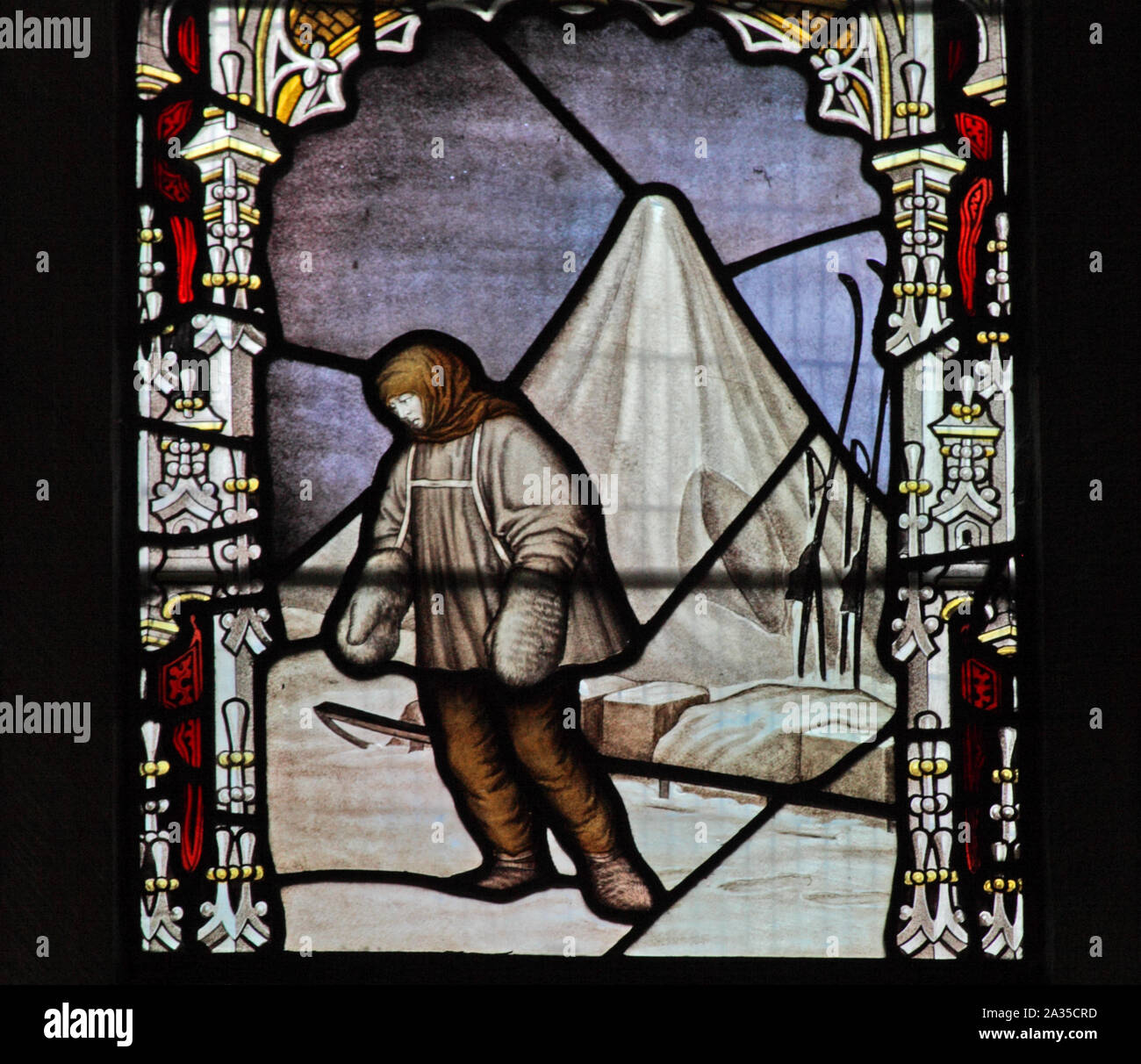 A stained glass window by the Kempe Studios. depicting scenes from Falcon Scott's Polar Expedition: Captain Oats leaves the tent for the last time. Stock Photo