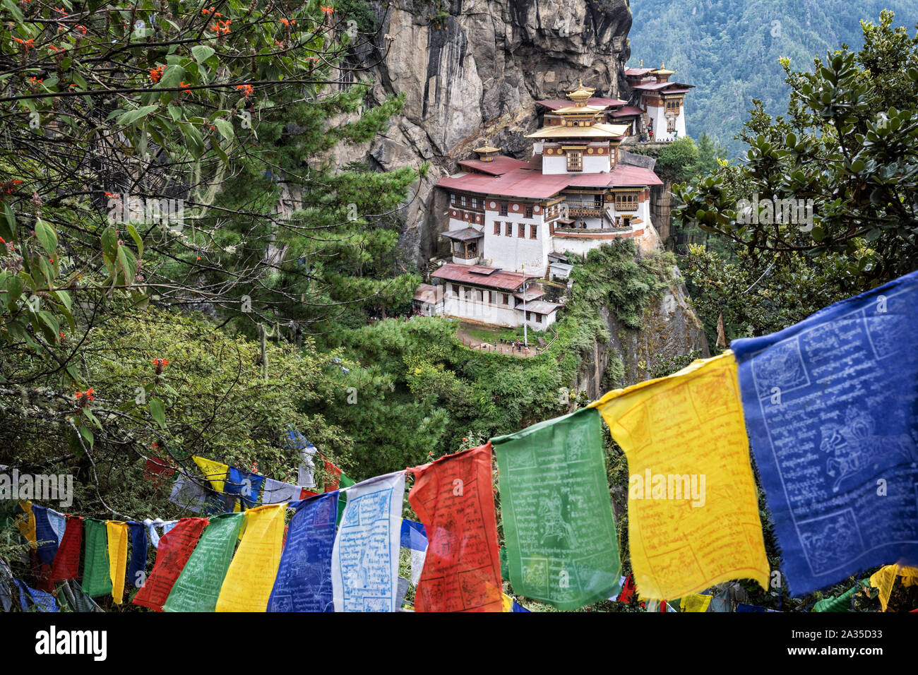 Prayer flags at Taktsang buddhist monastery (Tiger's Nest), Bhutan Stock Photo