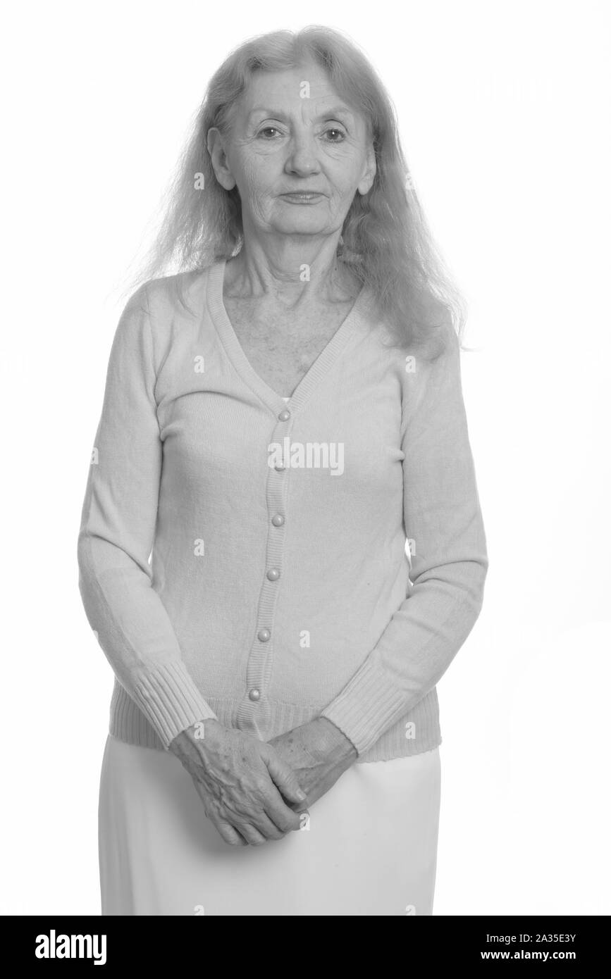 Studio shot of senior woman in black and white Stock Photo