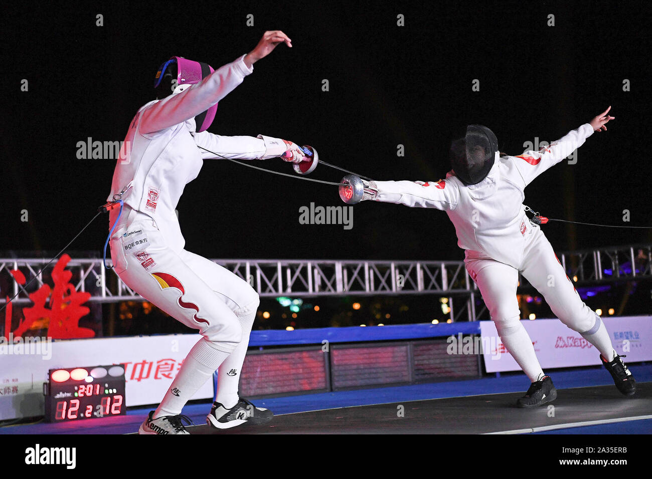 Nanchang, China's Jiangxi Province. 5th Oct, 2019. Sun Yiwen (L) of China competes with her teammate Xu Anqi during the women's epee final at the 2019 China Fencing Masters in Nanchang, east China's Jiangxi Province, Oct. 5, 2019. Credit: Wan Xiang/Xinhua/Alamy Live News Stock Photo