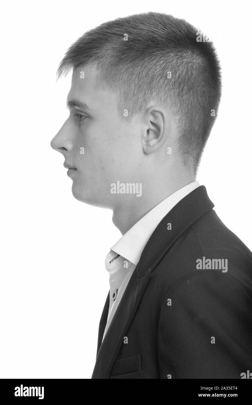 Profile view of young businessman in black and white Stock Photo - Alamy