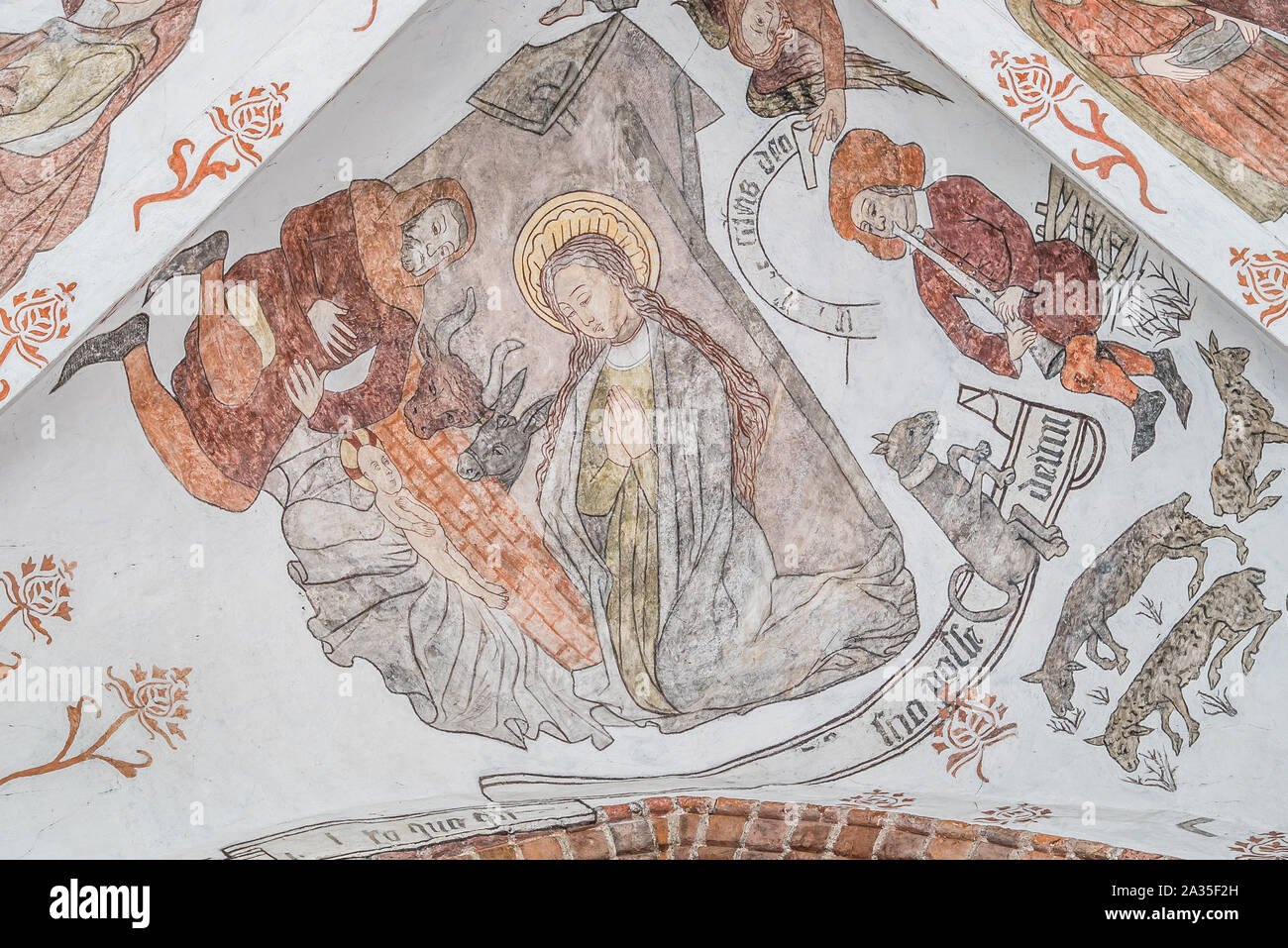 Birth of Jesus in Bethlehem, a wall-painting from about the year 1500 in the church of St. Mary, Elsinore, Denmark, May 14, 2019 Stock Photo