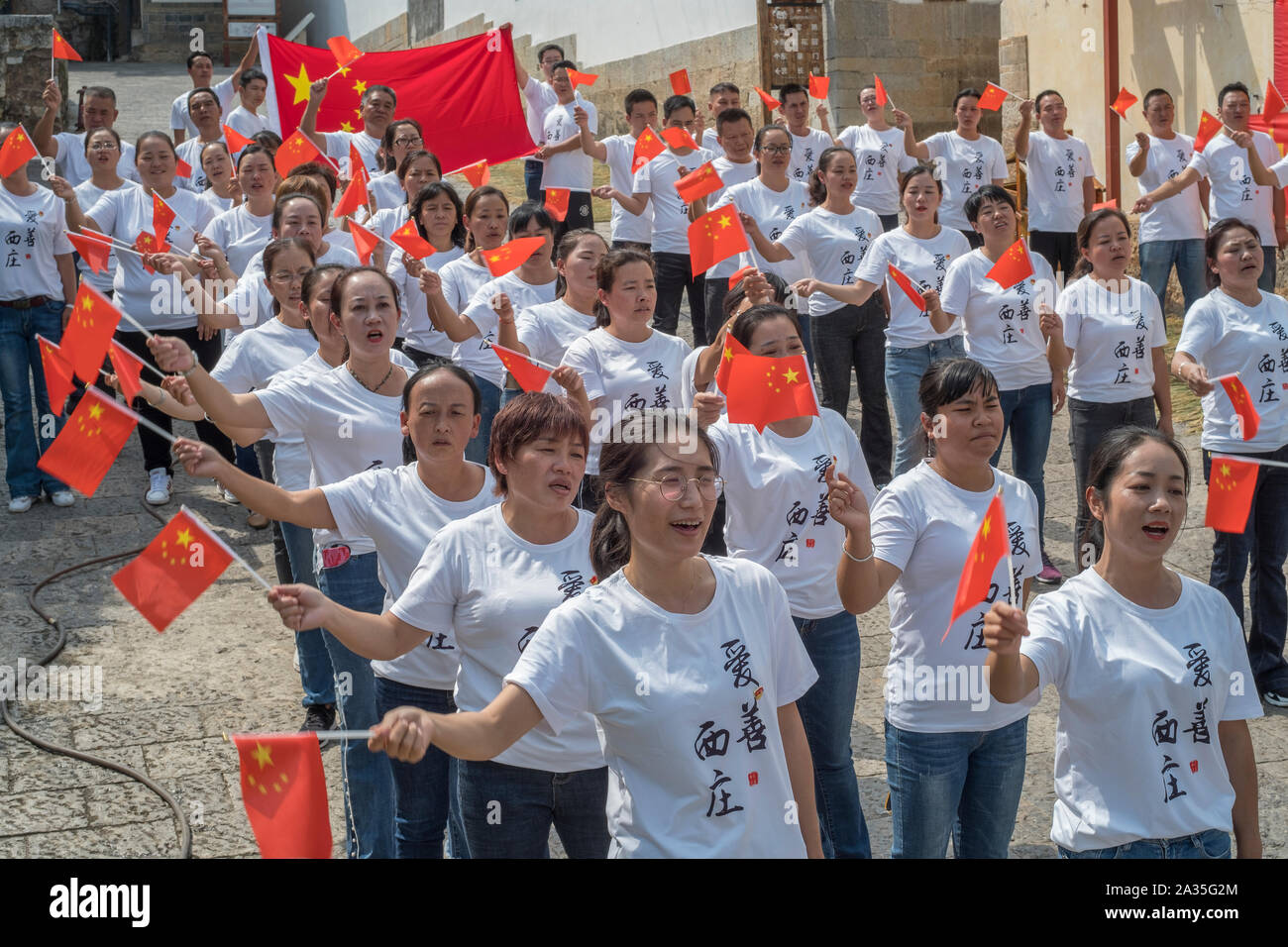 Young Communist Party members take part in Party-building activities in Jianshui County, Yunnan, China. Stock Photo