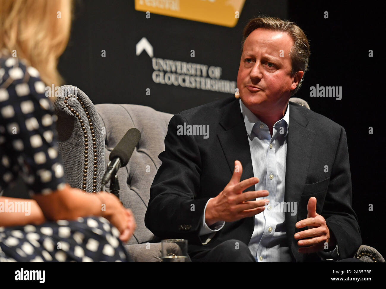 David Cameron speaking to Sophie Raworth during the Cheltenham Literature Festival at Cheltenham Racecourse. Stock Photo