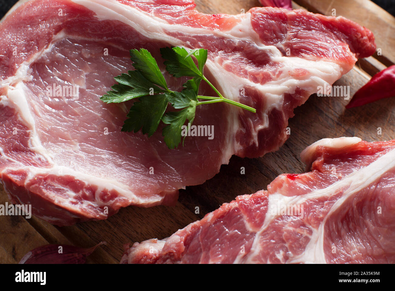 Raw pork steaks called in Italy capicola top view Stock Photo Alamy