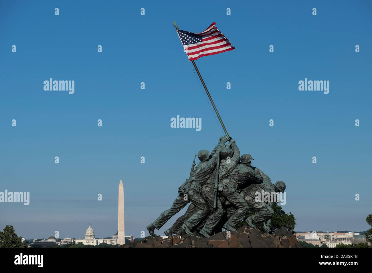 Iwo Jima Statue or US Marine Corps Memorial backed by the US Capitol Buiding and Washington Monument, Arlington Ridge Park, Washington DC, USA Stock Photo