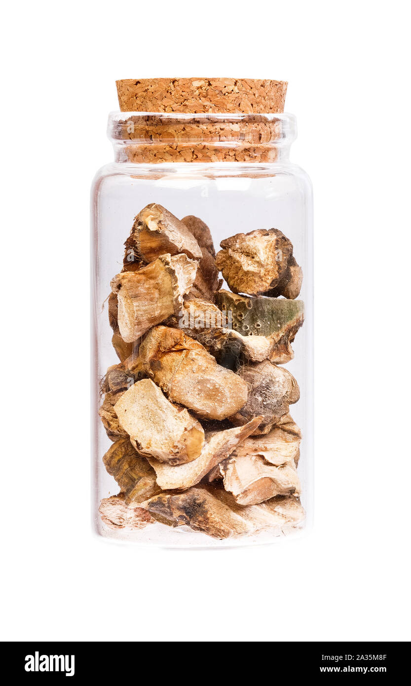 Acorus calamus in a bottle with cork stopper for medical use isolated. Stock Photo
