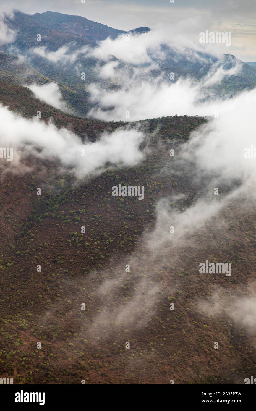 Africa, Kenya, Ngong Hills Nature Reserve, Aerial view of mist-covered slopes of Ngong Hills outside Nairobi Stock Photo