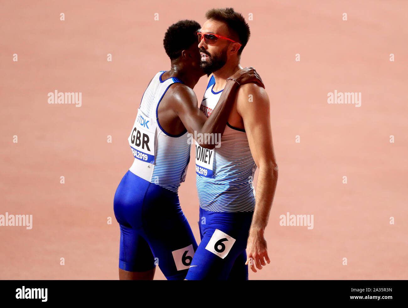Great Britain's Rabah Yousif (left) hugs Martyn Rooney after competing ...