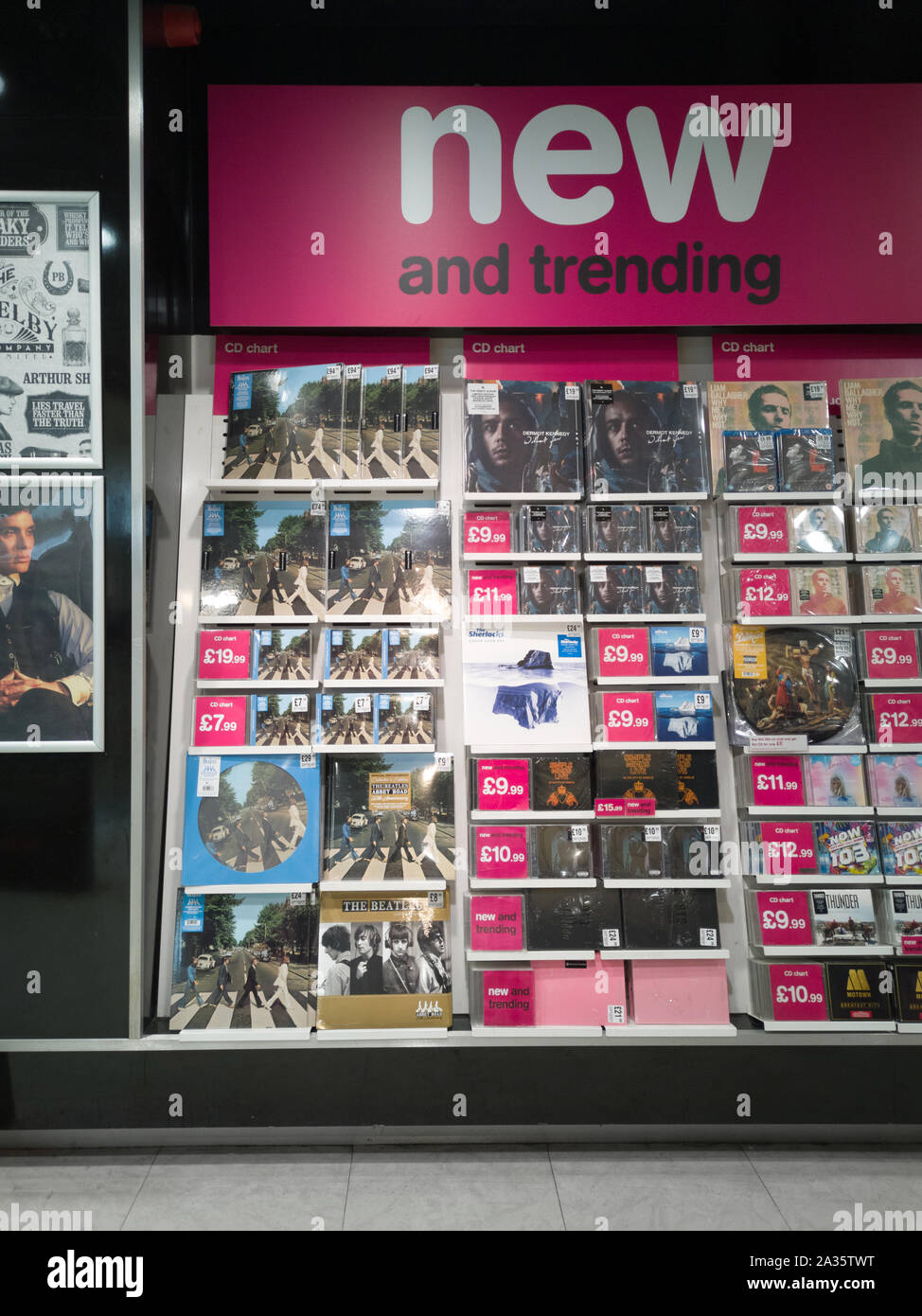 5th October 2019. The re-release of The Beatles album Abbey Road on it's 50th anniversary saw it go to number one, the top of the UK music charts. Here, a variety special editions including vinyl records and CD's can be seen in Birmingham's HMV store. The album has now set a record - the gap of 49 years and 252 days since its initial chart-topping run ended in early 1970 is the longest gap before returning to number one. Abbey Road is the eleventh studio album by the Beatles, released on 26 September 1969 by Apple Records. Stock Photo