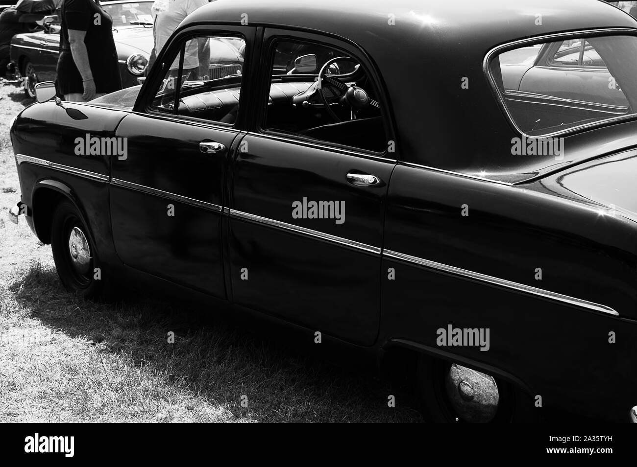 The side of a black 1955 Ford Consul  on display at a car show Stock Photo